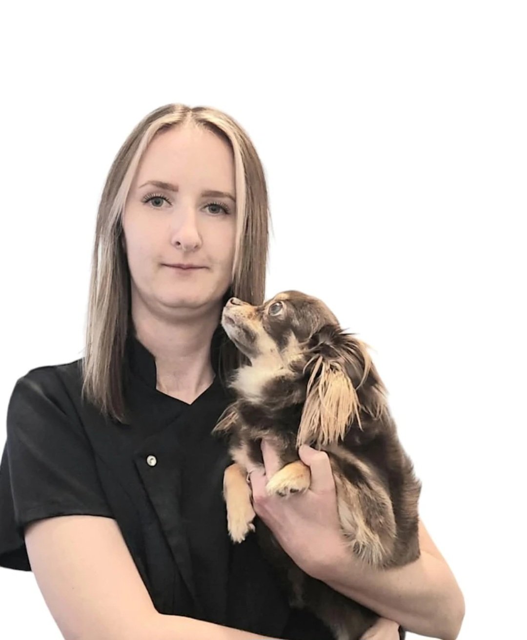 Profile Image Dee holding an affectionate dog